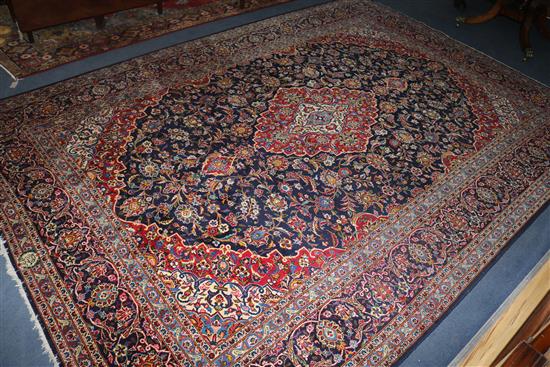 An Iranian Kashan carpet, 12ft 6in. by 8ft 11in.